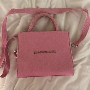 Brandon Blackwood pink End systematic Racism bag